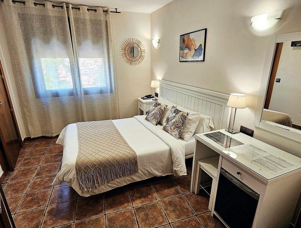 Foto de una habitación de Hotel Medina de Toledo