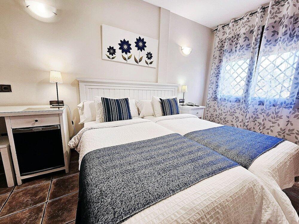 Foto de una habitación de Hotel Medina de Toledo