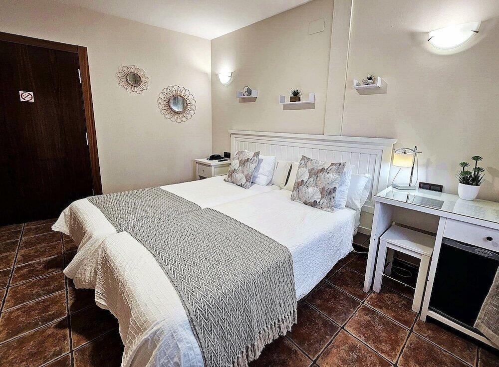 Foto de una habitación de Hotel Medina de Toledo