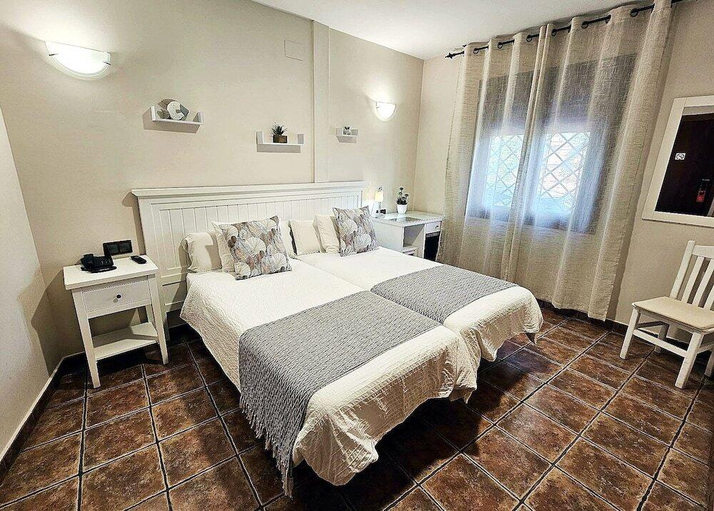 Foto de una habitación de Hotel Medina de Toledo
