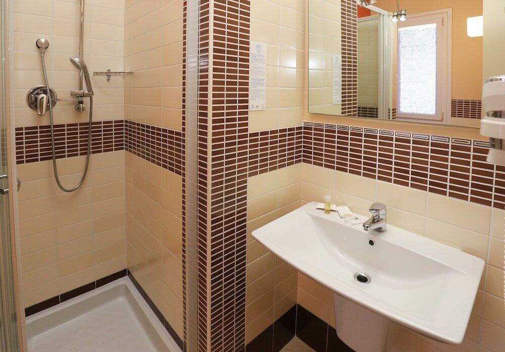 Foto de una habitación de Janus Hotel