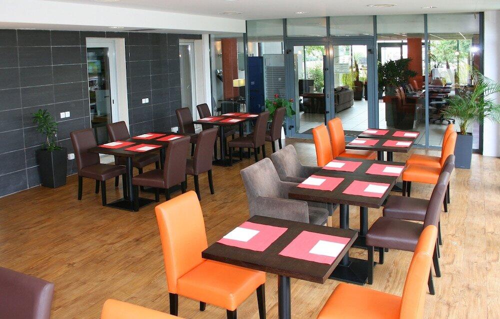 Foto de restauración de Aparthotel Odalys City Lyon Bioparc
