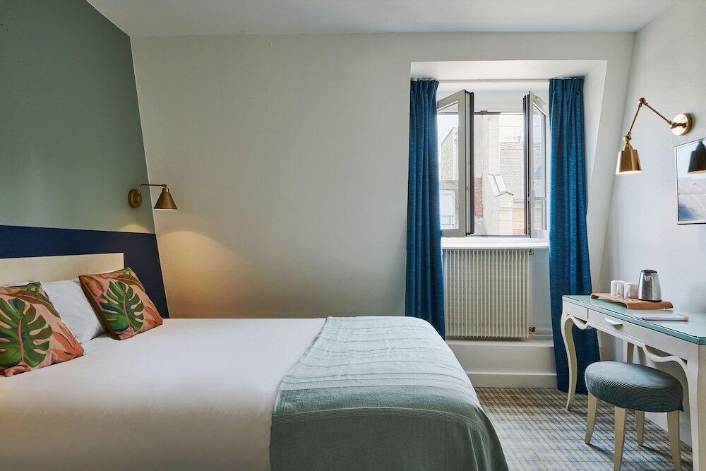Foto de una habitación de Hotel Etoile Saint Ferdinand by Happyculture