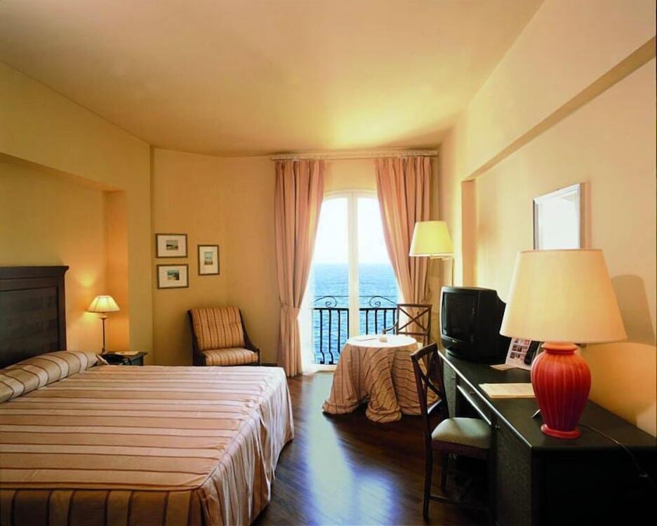Foto de una habitación de Grand Hotel Baia Verde