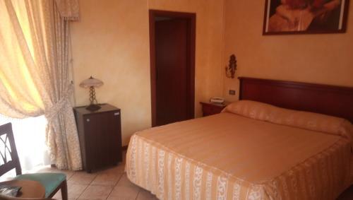 Foto de una habitación de Garda Sol SPA Hotel &amp;amp; Appartamenti