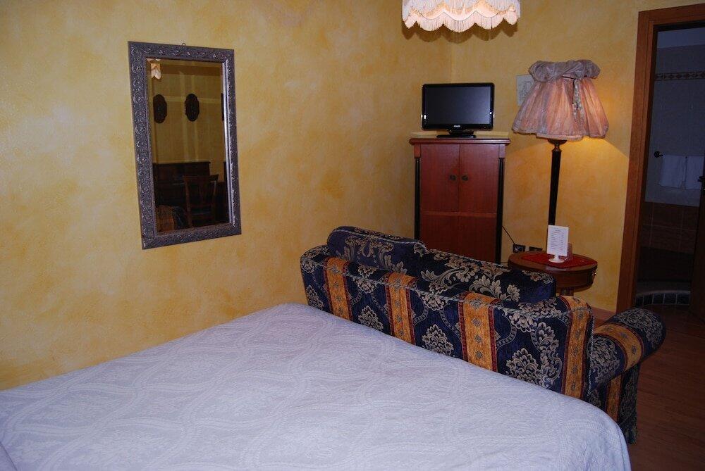Foto de una habitación de Garda Sol SPA Hotel &amp;amp; Appartamenti