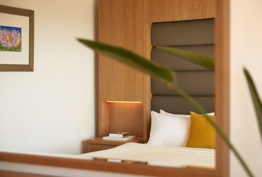Foto de una habitación de Hotel Minoa Palace Resort