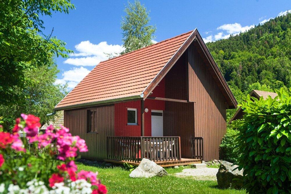 Foto de una habitación de Auberge et Chalets de la Wormsa