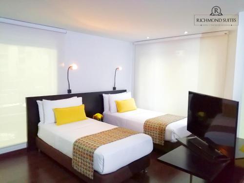 Foto de una habitación de Richmond Suites Hotel