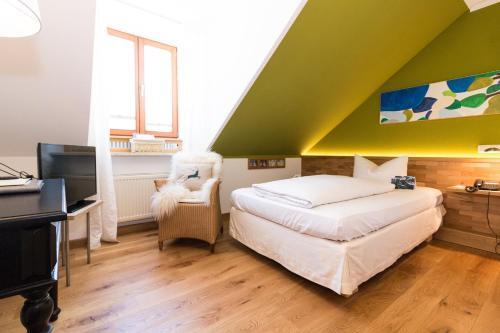 Foto de una habitación de Romantik Hotel Hirschen