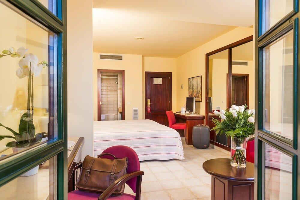 Foto de una habitación de Hotel Guitart Rosa - Adults Only