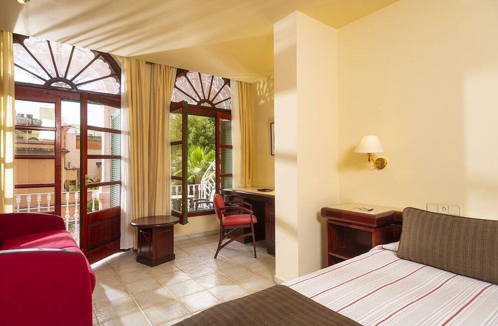 Foto de una habitación de Hotel Guitart Rosa - Adults Only