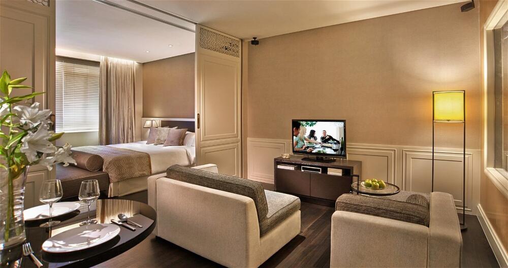 Foto de una habitación de Hotel Ascott Raffles Place Singapore