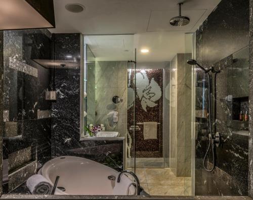 Foto del baño de Hotel Ascott Raffles Place Singapore