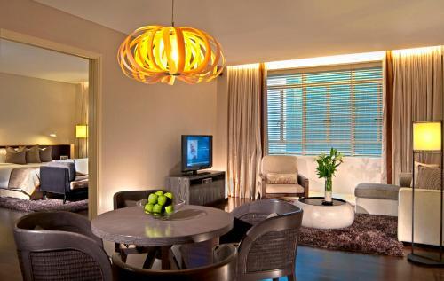 Foto de una habitación de Hotel Ascott Raffles Place Singapore