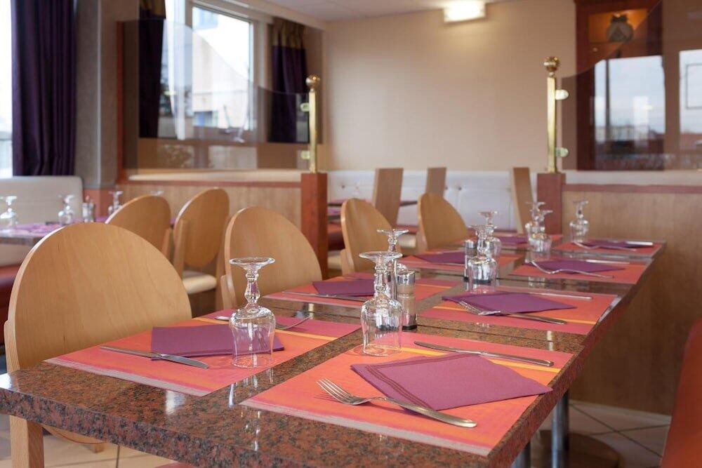 Foto de restauración de Geographotel Paris-Roissy CDG Airport