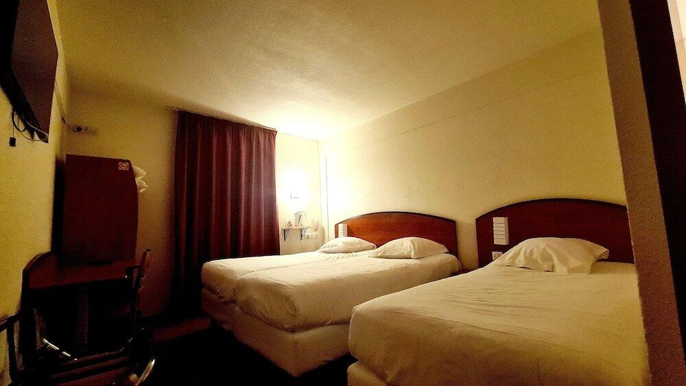 Foto de una habitación de Geographotel Paris-Roissy CDG Airport