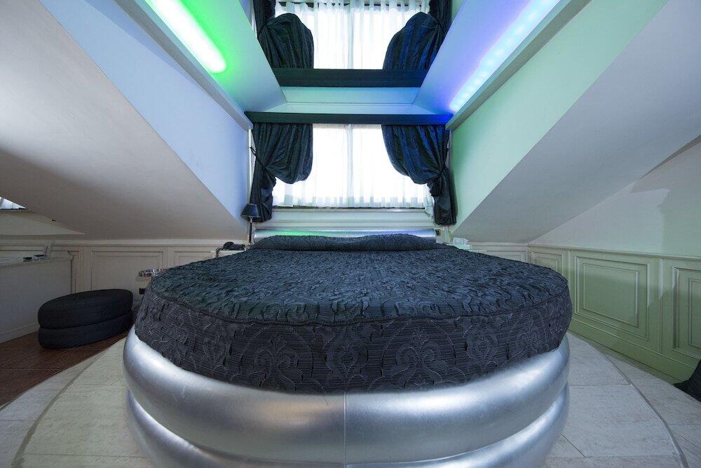 Foto de una habitación de Mancini Park Hotel
