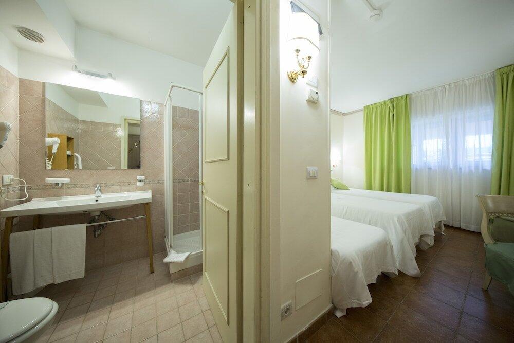 Foto de una habitación de Mancini Park Hotel