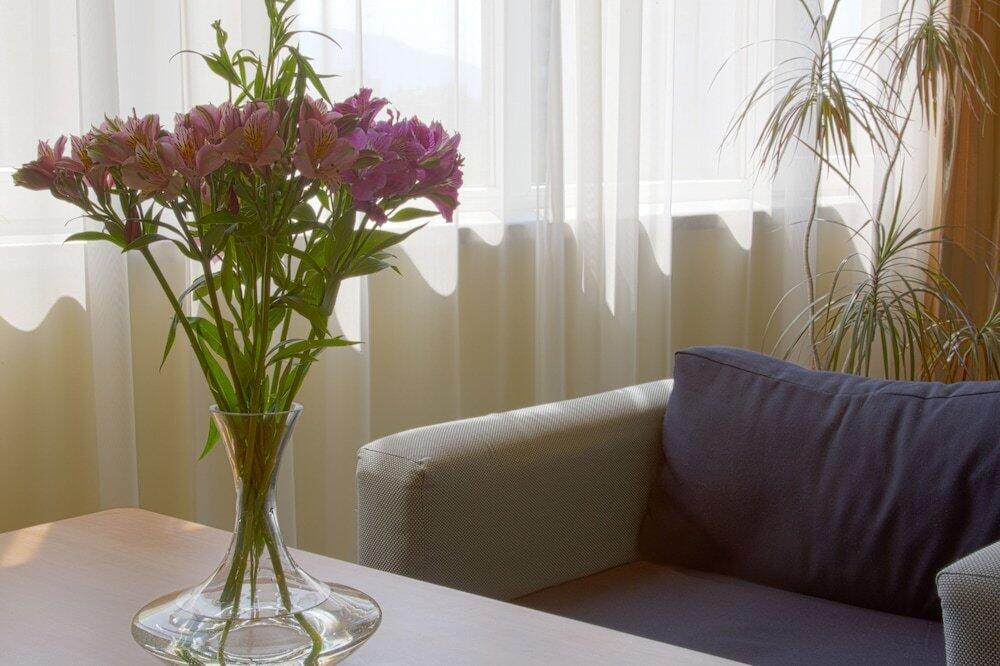 Foto de una habitación de Triada Hotel