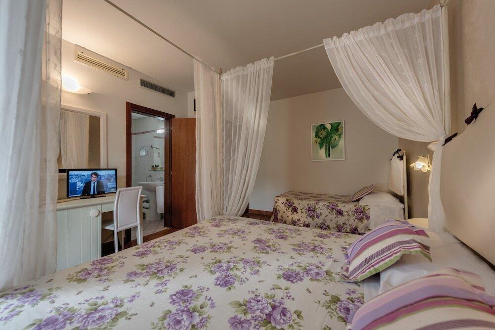 Foto de una habitación de Hotel &amp;amp; Restaurant Casolare Le Terre Rosse