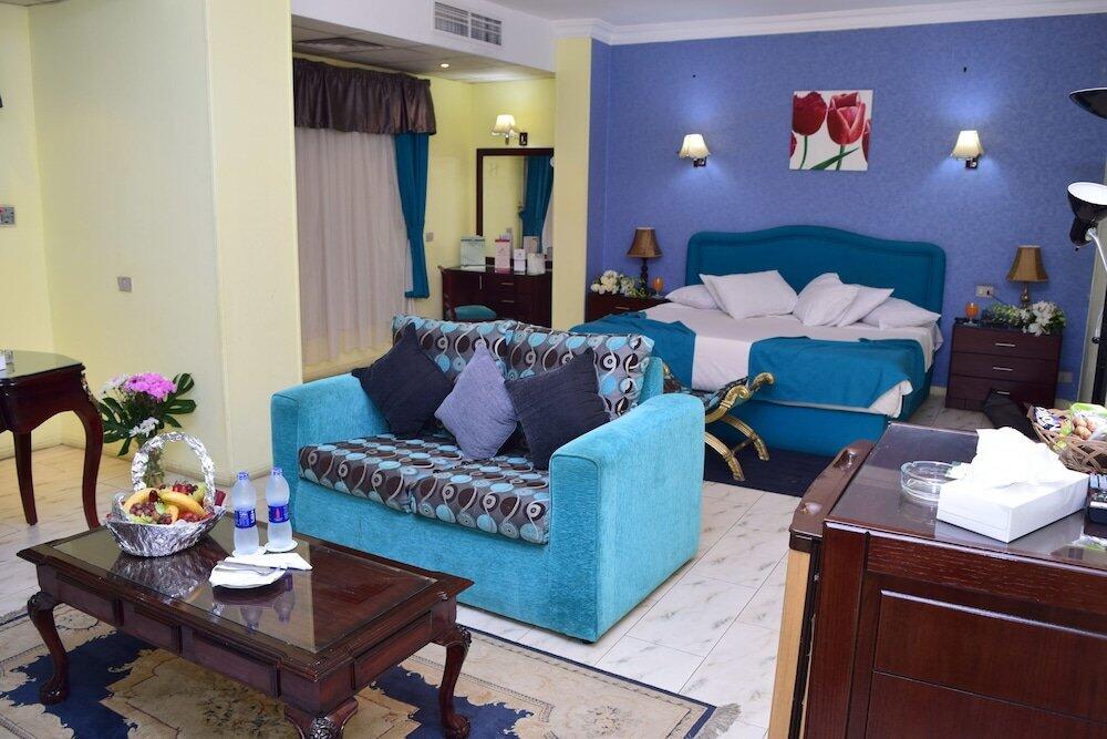 Foto de una habitación de Holidays Express Hotel