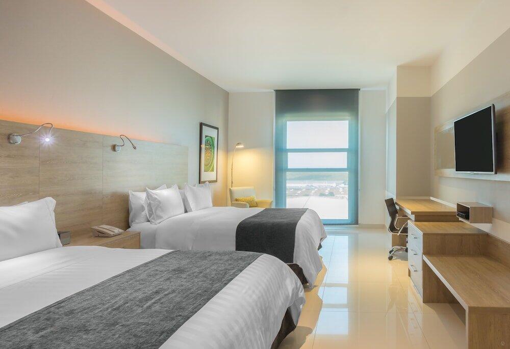 Foto de una habitación de GHL Collection Barranquilla Hotel