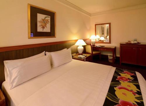 Foto de una habitación de The Jesselton Hotel