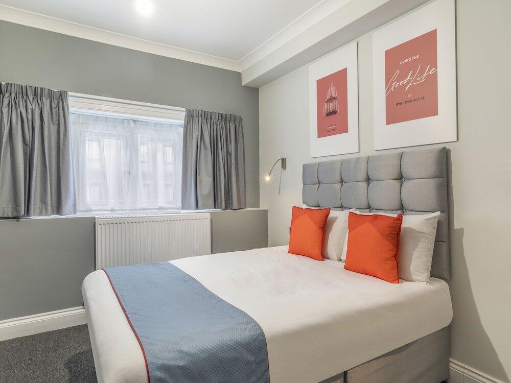 Foto de una habitación de Hotel OYO Townhouse Apollo