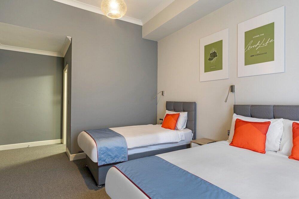 Foto de una habitación de Hotel OYO Townhouse Apollo