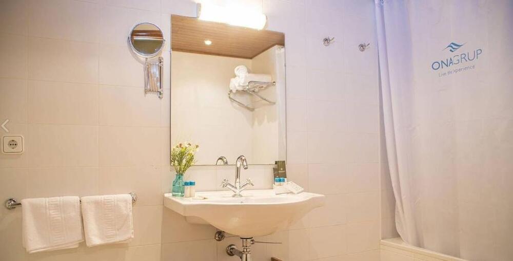 Foto del baño de Aparthotel Ona Dorada el Tarter