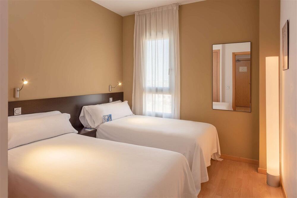 Foto de una habitación de Hotel Madrid Airport Suites, Affiliated by Meliá
