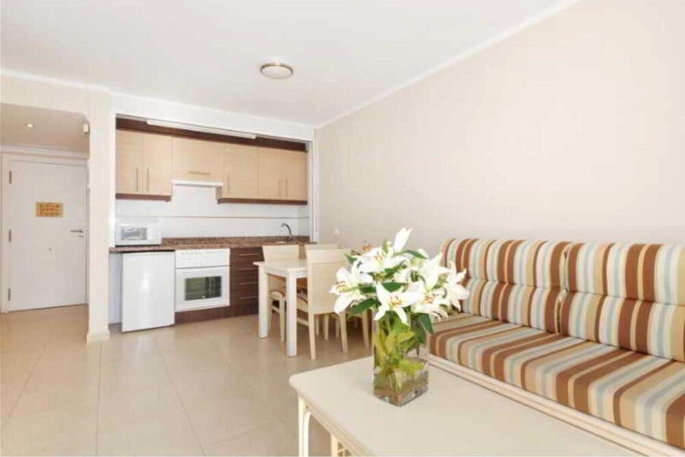 Foto de una habitación de Apartamentos Larimar Unitursa
