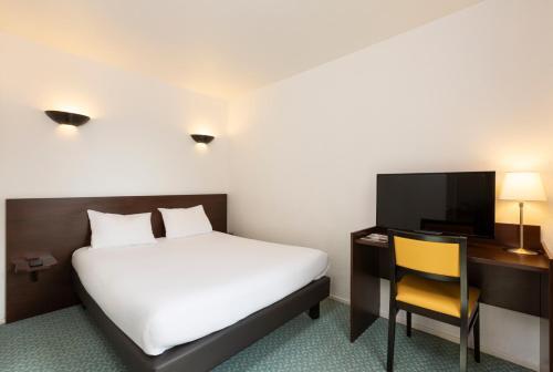 Foto de una habitación de Aparthotel Adagio Access La Défense - Léonard De Vinci