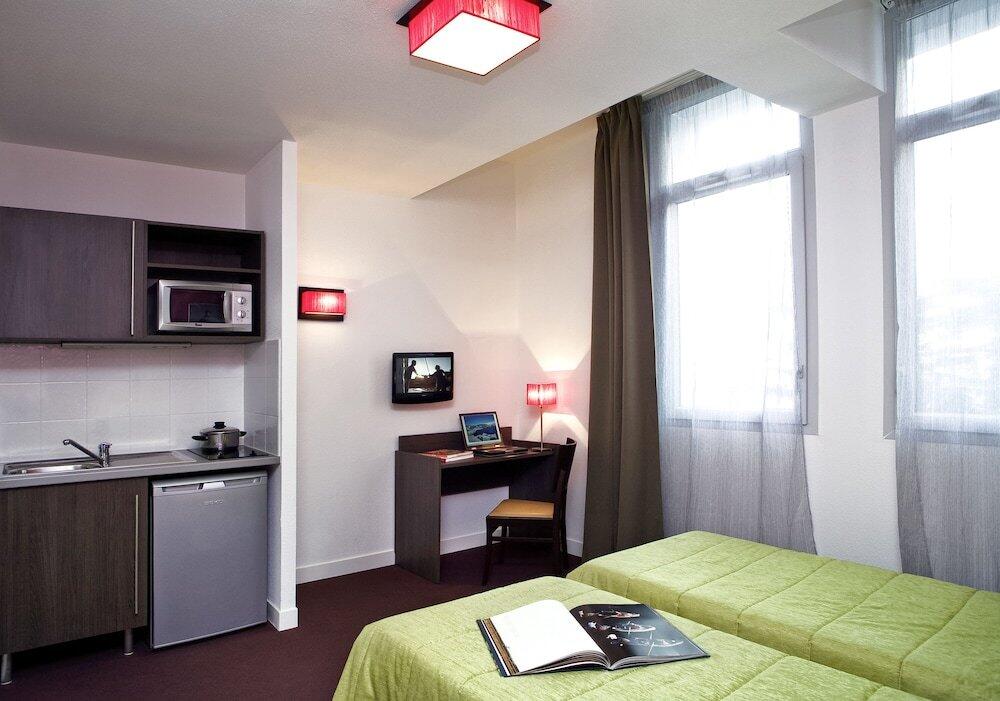 Foto de una habitación de Aparthotel Adagio Access Toulouse St Cyprien