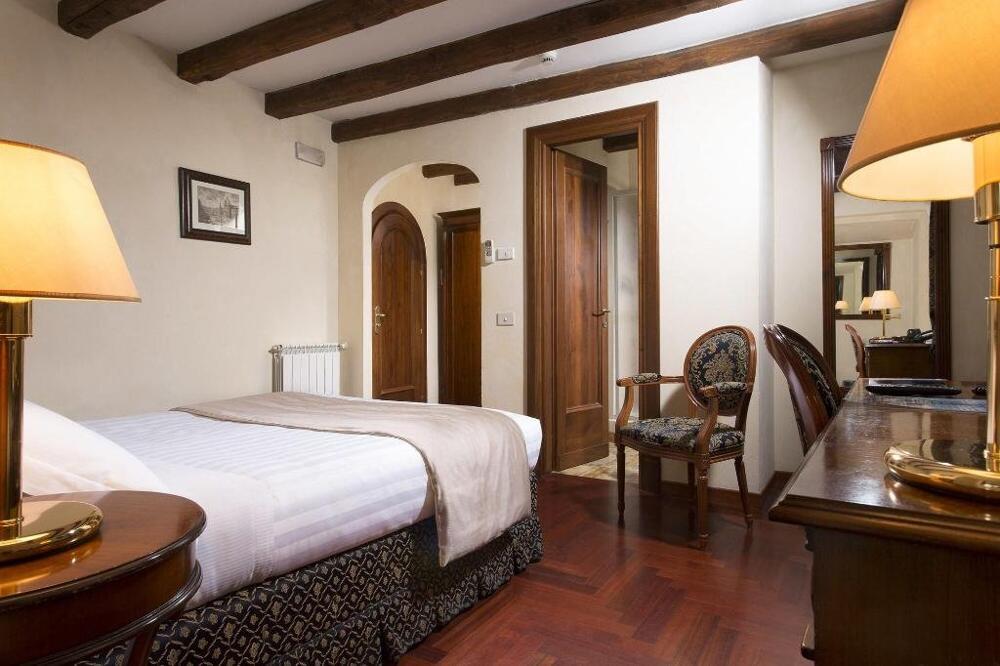 Foto de una habitación de Hotel Teatro Pace