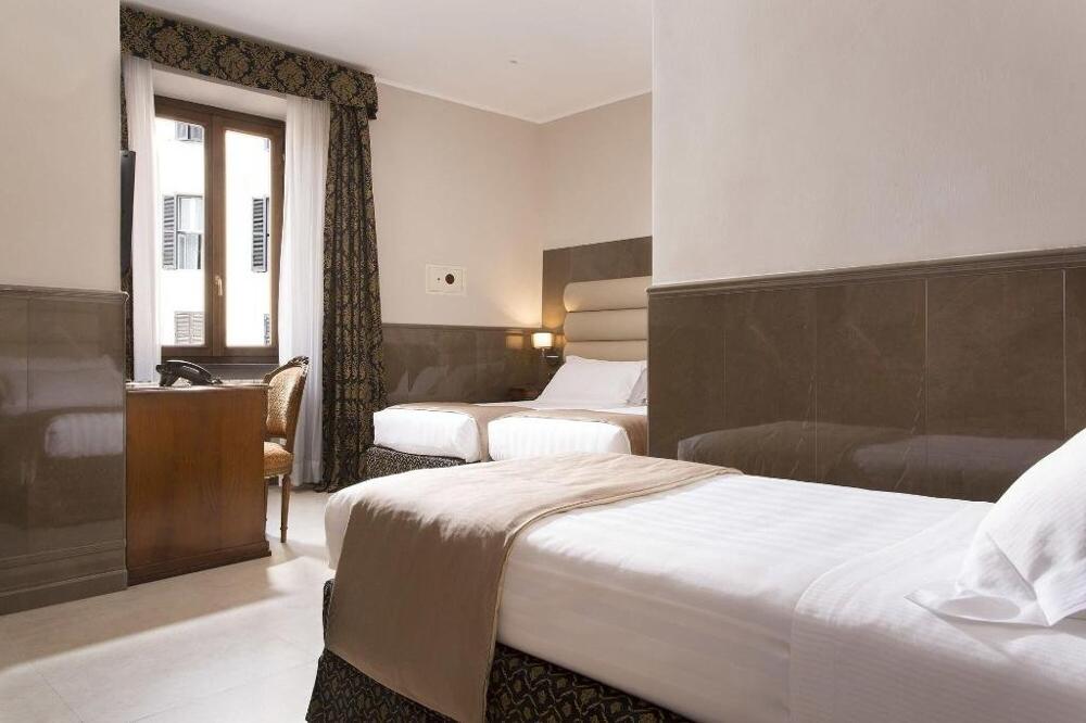 Foto de una habitación de Hotel Teatro Pace