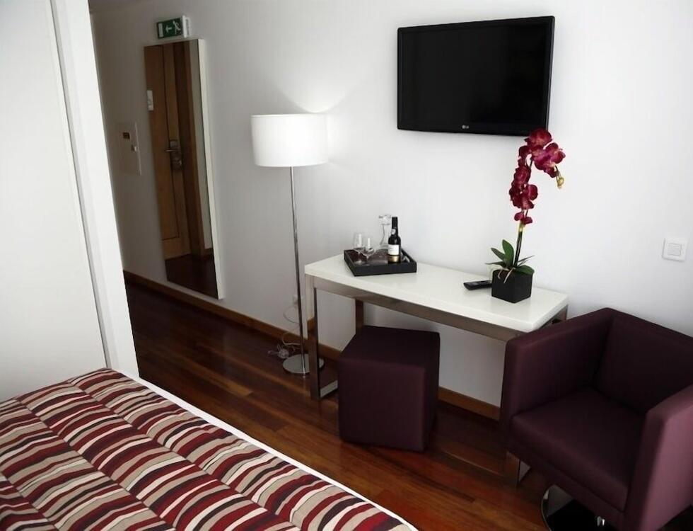 Foto de una habitación de LBV House Hotel
