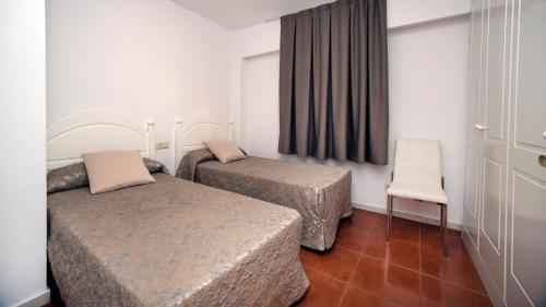 Foto de una habitación de Apartamentos Leo Isla Canela Selection