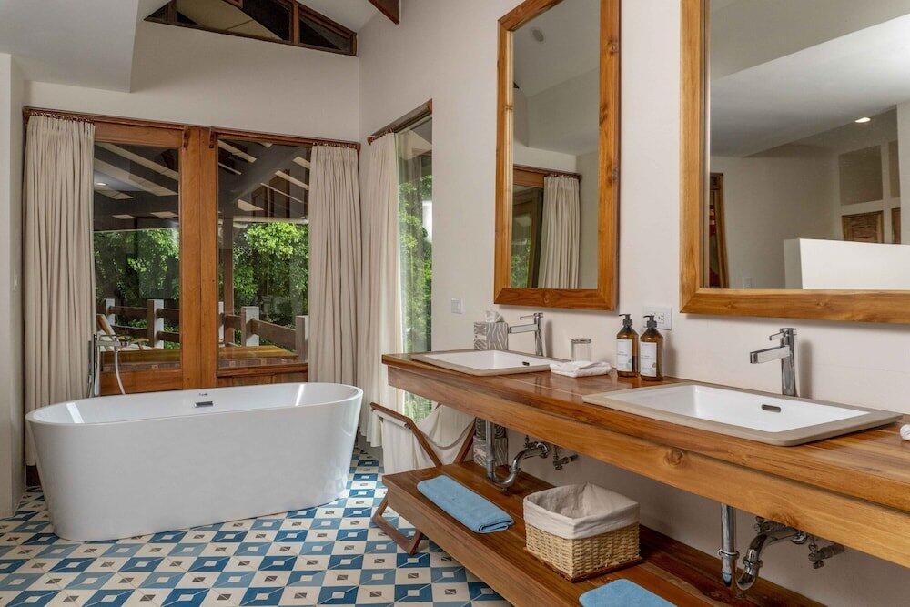 Foto del baño de Capitán Suizo Beachfront Boutique Hotel