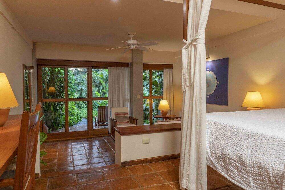 Foto de una habitación de Capitán Suizo Beachfront Boutique Hotel