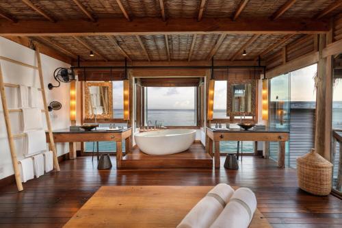 Foto del baño de Complejo Gili Lankanfushi Maldives