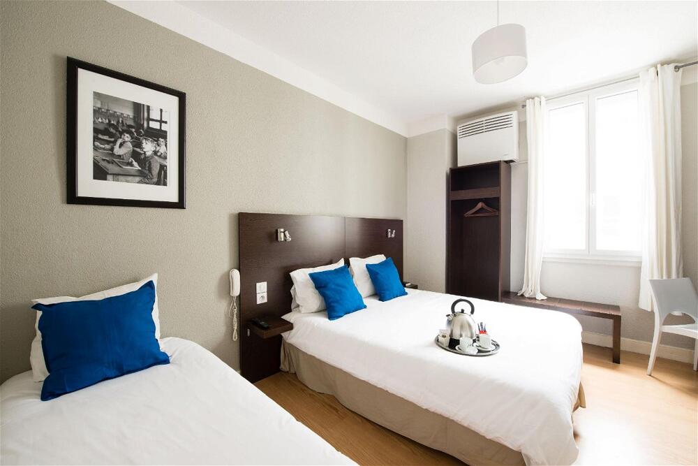 Foto de una habitación de Hôtel Atrium Mondial