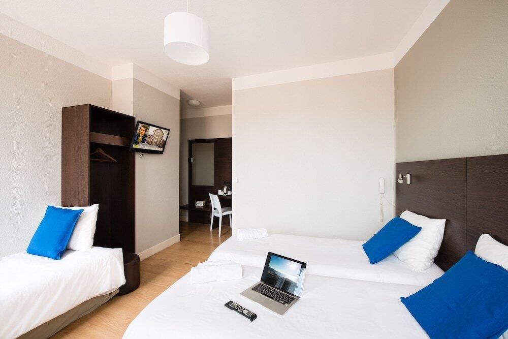 Foto de una habitación de Hôtel Atrium Mondial