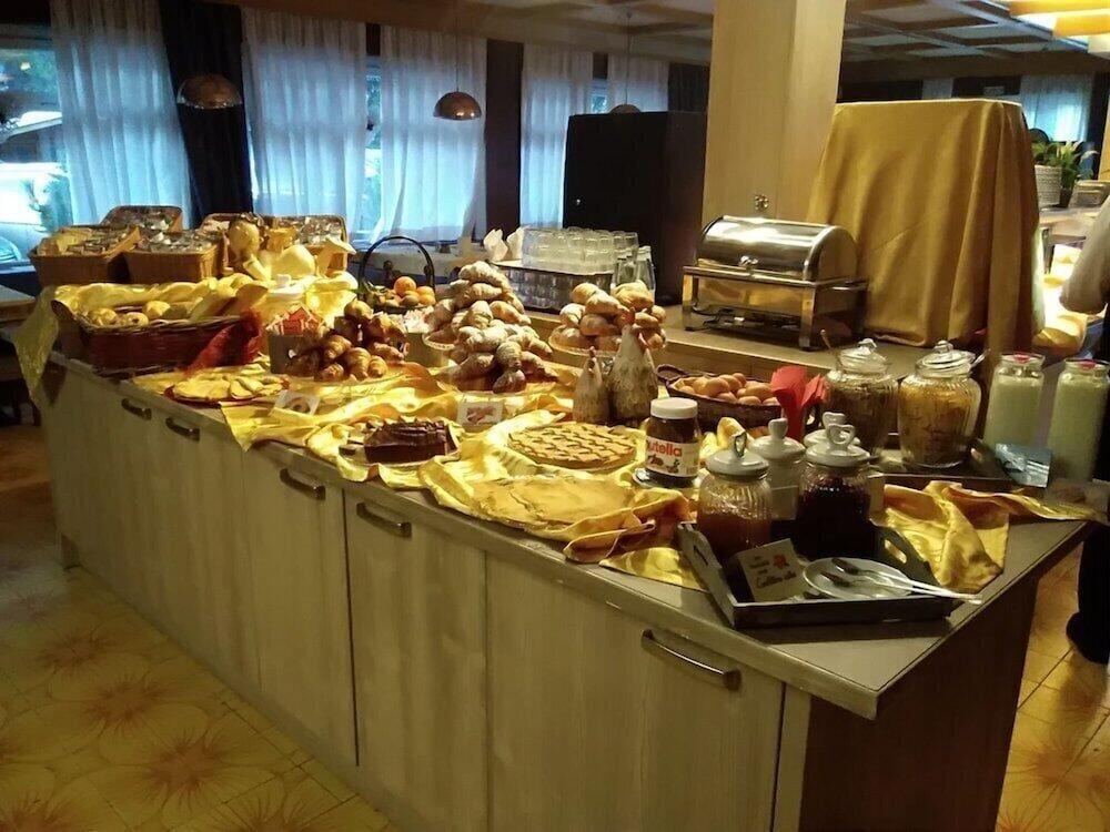 Foto de restauración de Hotel il Caminetto Sport