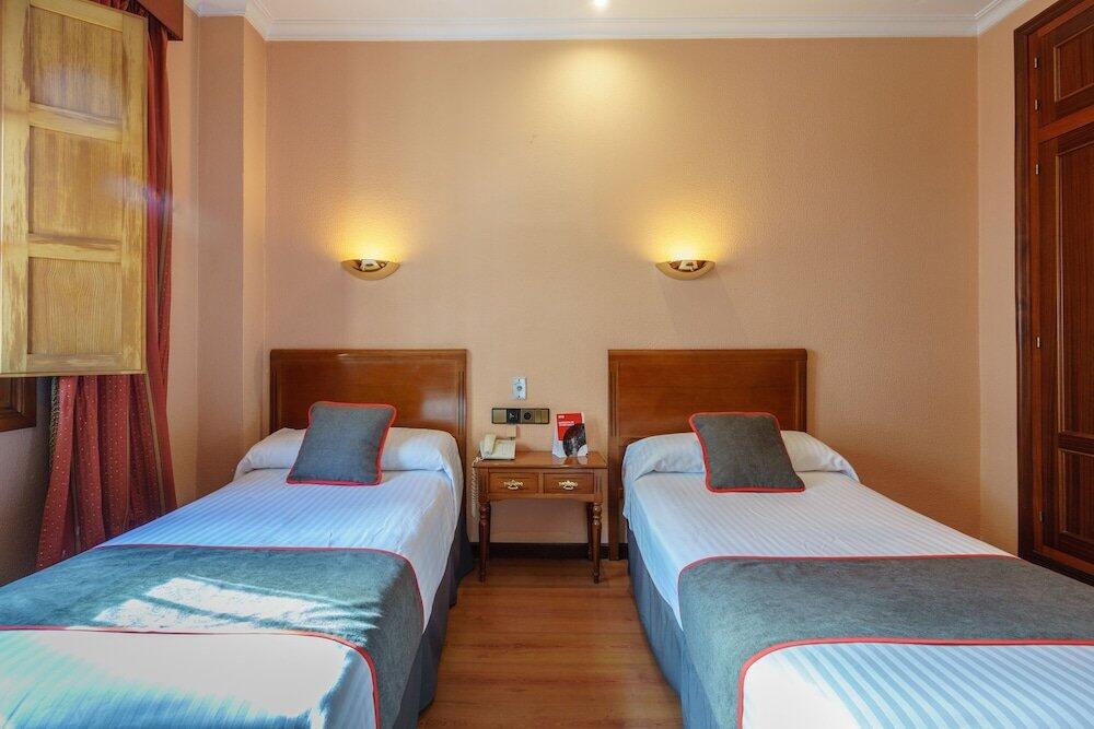 Foto de una habitación de Hotel Los Castaños
