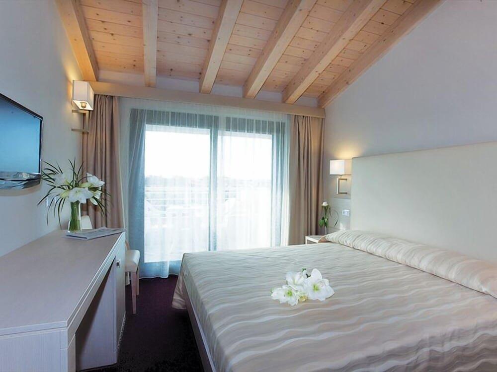 Foto de una habitación de Hotel Porto Azzurro
