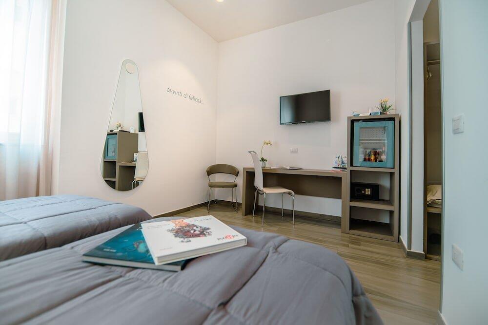 Foto de una habitación de Hotel Bruman Salerno