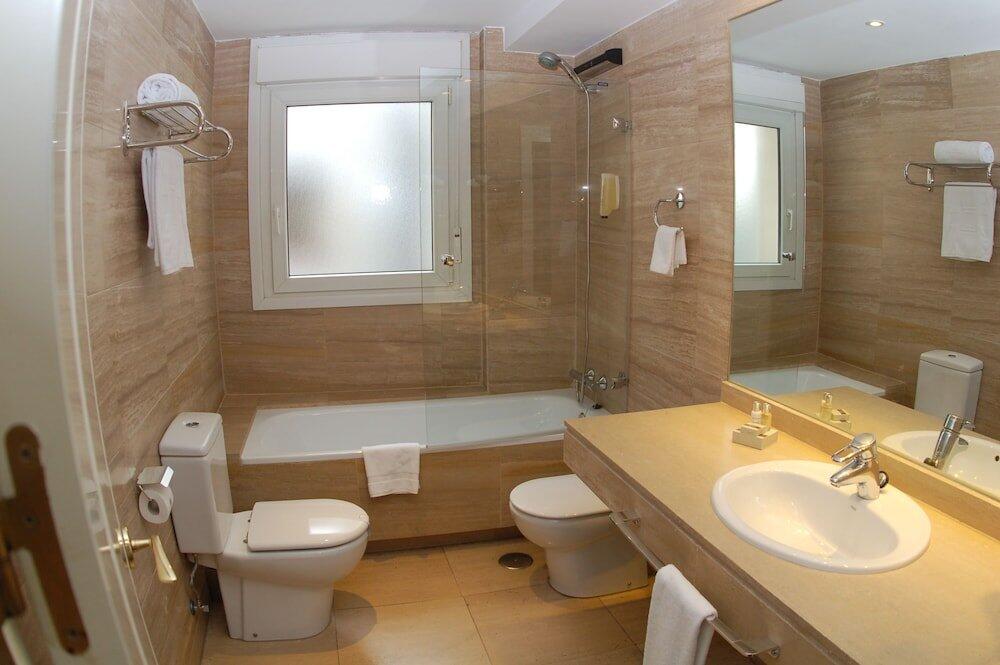 Foto del baño de Apartamentos Boutike Cibeles