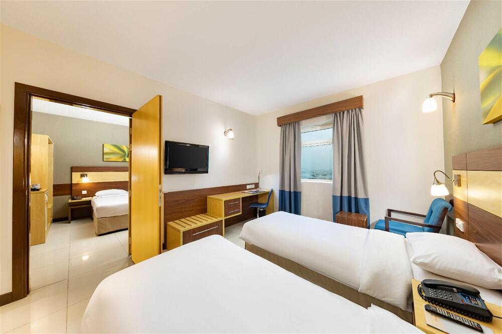 Foto de una habitación de Hotel Citymax Sharjah
